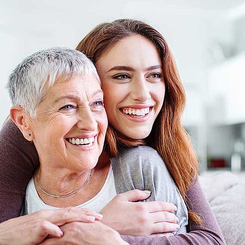 Mère avec fille souriantes | Protefix